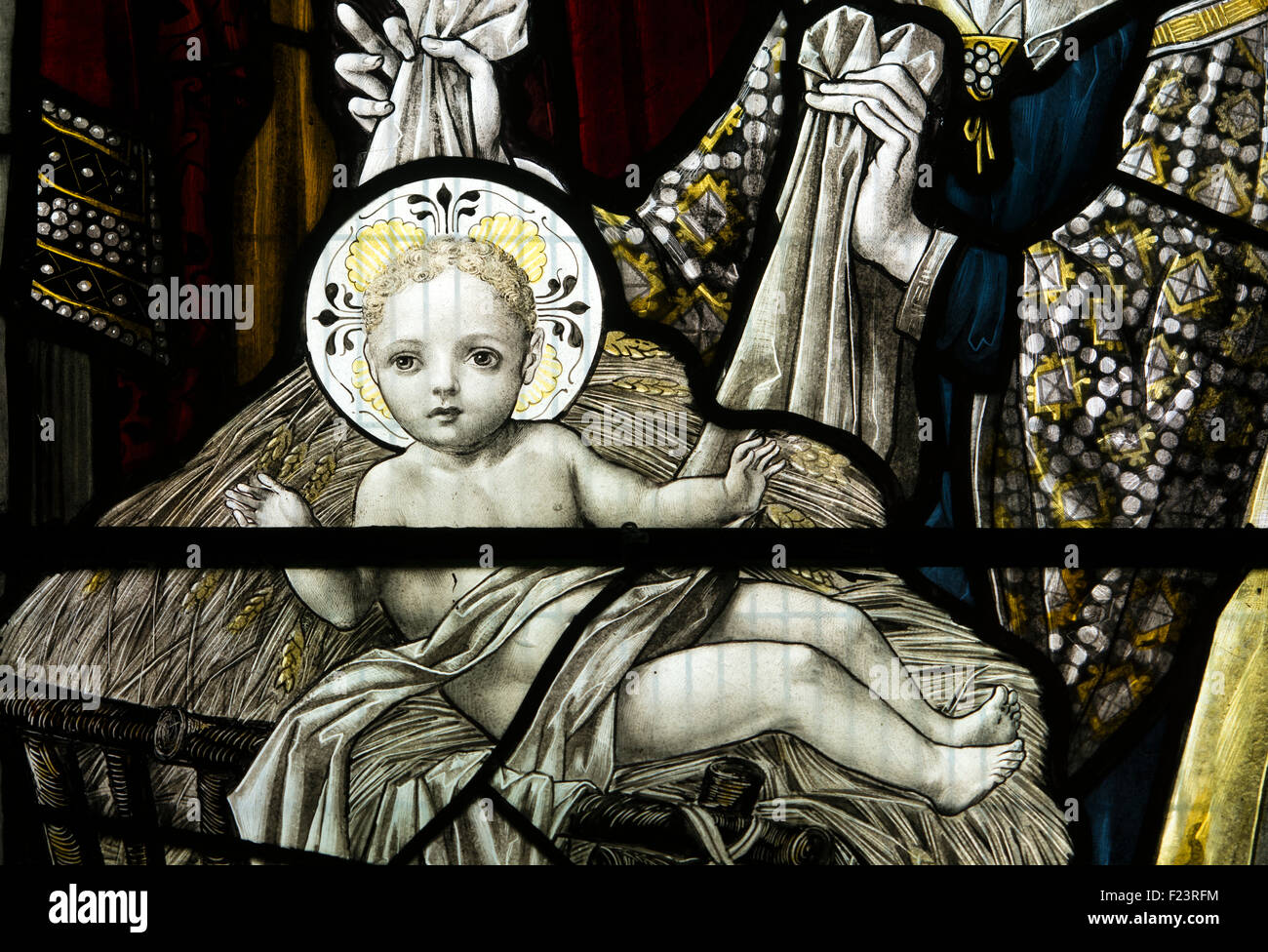 Infant Jesus, nativity stained glass detail, St. Andrew`s Church, Chedworth, Gloucestershire, England, UK Stock Photo